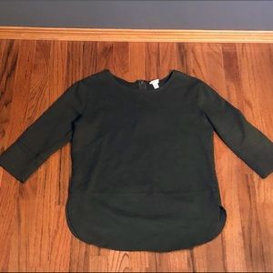 pullover sweater with back zipper.